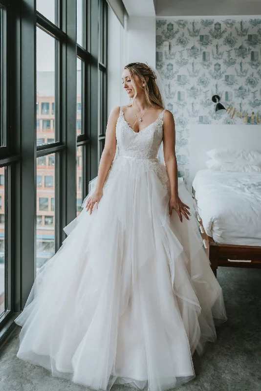 Wedding Dresses with Sheer Sleeve and Sequined Cuffs and Embroidered Bodice and Bow at the Waist for an Elegant and Sparkly LookAlvina Valenta 9605 Wedding Dresses with Sheer Sleeve and Sequined Cuffs and Embroidered Bodice and Bow at the Waist for an Elegant and Sparkly LookAlvina Valenta 9605
