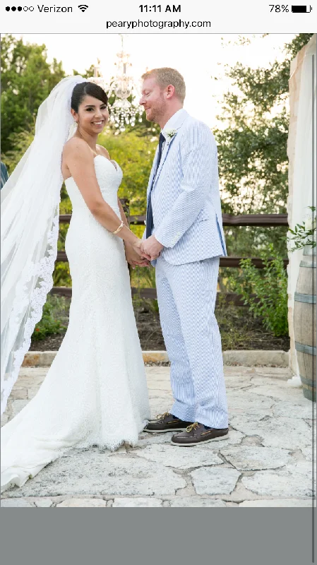Wedding Dresses with Sequined Floral Motifs and Satin Ribbon Detailing and Lace Trim for an Elegant and Delicate LookAlvina Valenta Ti Adora Wedding Dresses with Sequined Floral Motifs and Satin Ribbon Detailing and Lace Trim for an Elegant and Delicate LookAlvina Valenta Ti Adora