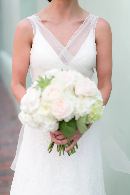 Wedding Dresses with Ruffled Sleeves and High Neck and Belt for a Dramatic and Elegant LookAlyne Bridal Jasmine Wedding Dresses with Ruffled Sleeves and High Neck and Belt for a Dramatic and Elegant LookAlyne Bridal Jasmine