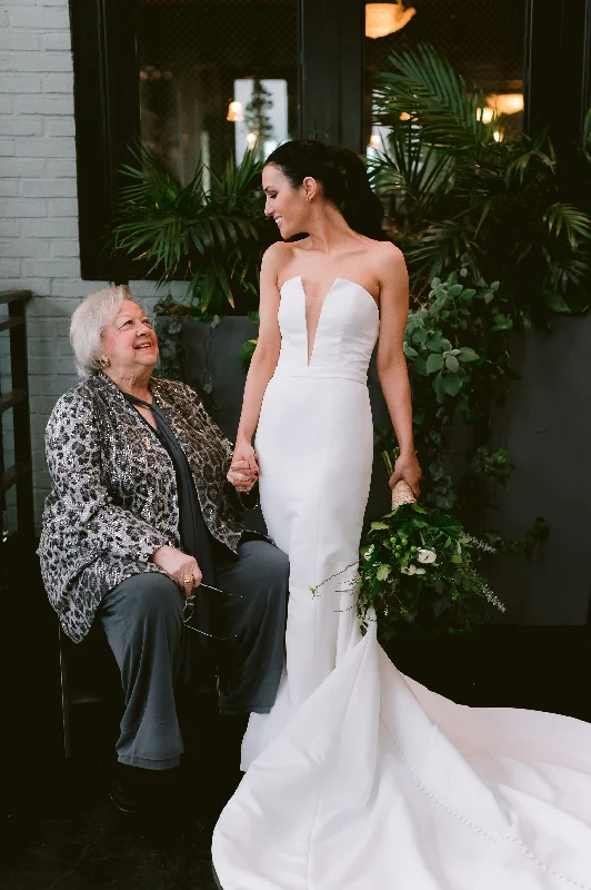 Strapless Wedding Dresses with Tassel Accents and Sequined Belt for a Fun LookAlyne Bridal Windsor Strapless Wedding Dresses with Tassel Accents and Sequined Belt for a Fun LookAlyne Bridal Windsor