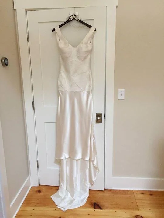 Wedding Dresses with Satin and Lace Trimmed Neckline and Ruffled Sleeves and Embroidered Skirt and Bow at the Back and Belt for a Sophisticated and Girly LookAmanda Wakeley Morocco Wedding Dresses with Satin and Lace Trimmed Neckline and Ruffled Sleeves and Embroidered Skirt and Bow at the Back and Belt for a Sophisticated and Girly LookAmanda Wakeley Morocco