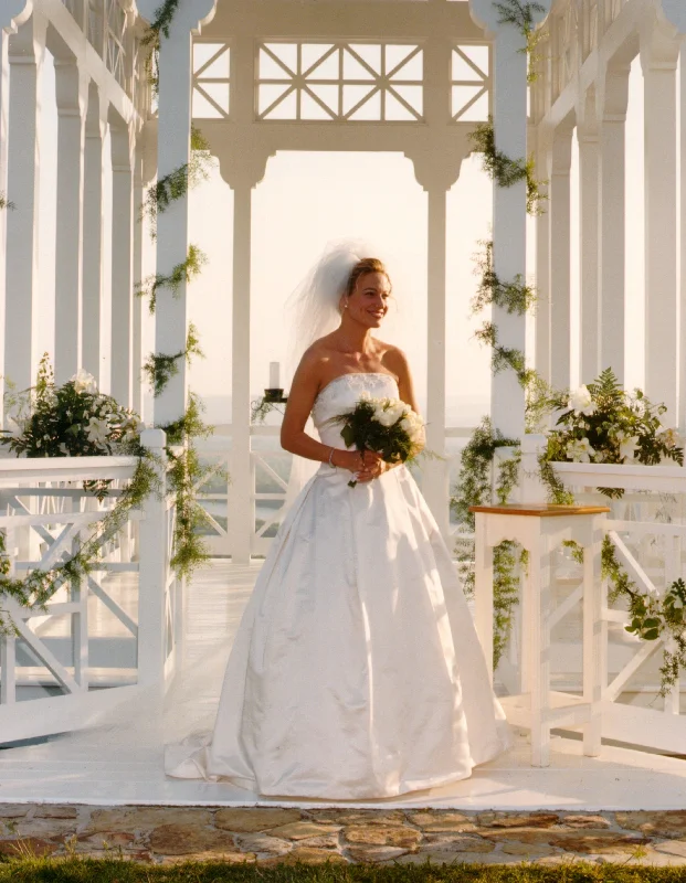 Wedding Dresses with Sheer Sleeve and Sequined Cuffs and Embroidered Bodice and Bow at the Waist for an Elegant and Sparkly LookAmsale Classic Silk Satin Strapless A-Line Wedding Dresses with Sheer Sleeve and Sequined Cuffs and Embroidered Bodice and Bow at the Waist for an Elegant and Sparkly LookAmsale Classic Silk Satin Strapless A-Line