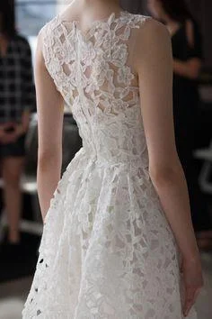 Wedding Dresses with Cut Out Details and Lace Insertions for a Bold and Feminine LookAmsale Lake Wedding Dresses with Cut Out Details and Lace Insertions for a Bold and Feminine LookAmsale Lake