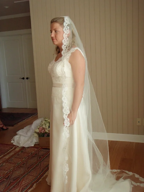 Wedding Dresses with Sequined Hearts and Ruffled Hem and Satin and Lace Combo and Bow at the Waist and Embroidered Floral Patterns and Belt for a Romantic and Sweet LookAmy Kuschel Alexandra Wedding Dresses with Sequined Hearts and Ruffled Hem and Satin and Lace Combo and Bow at the Waist and Embroidered Floral Patterns and Belt for a Romantic and Sweet LookAmy Kuschel Alexandra
