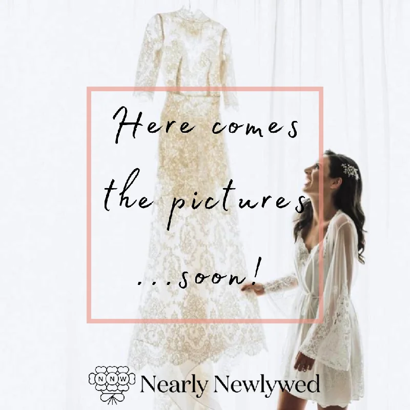 Wedding Dresses with Sheer Panels and Beaded Trim and Embroidered Paisley Patterns and Ruffled Hem and Belt for a Sultry and Exotic LookAmy Kuschel Ali 45123726 Wedding Dresses with Sheer Panels and Beaded Trim and Embroidered Paisley Patterns and Ruffled Hem and Belt for a Sultry and Exotic LookAmy Kuschel Ali 45123726