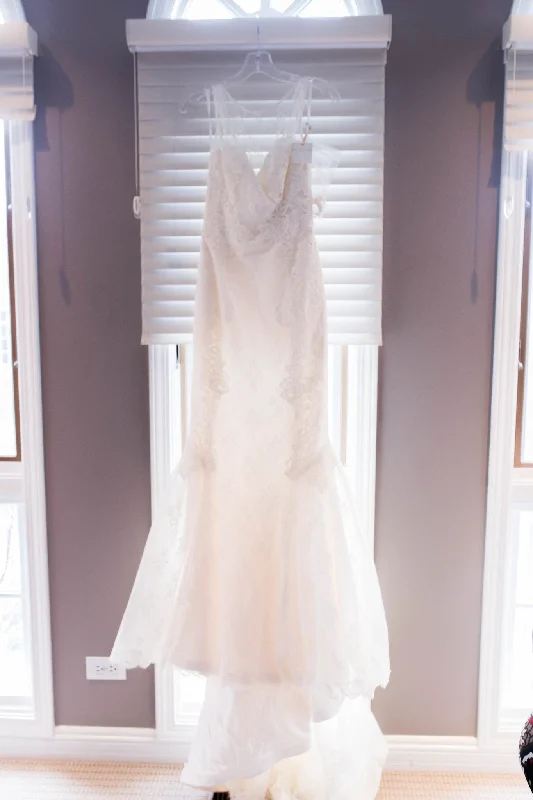 Wedding Dresses with Sequined Geometric Shapes and Lace and Chiffon Blend and Ruffled Sleeves and Belt and Embroidered Skirt for a Modern and Dramatic LookAmy Kuschel Monroe