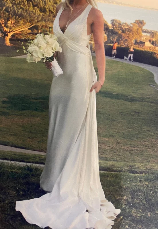 Wedding Dresses with Satin Trimmed Collar and Bow Back and Embroidered Skirt and Sequined Bodice and Belt for a Classic and Glamorous LookAmy Michelson Wedding Dresses with Satin Trimmed Collar and Bow Back and Embroidered Skirt and Sequined Bodice and Belt for a Classic and Glamorous LookAmy Michelson