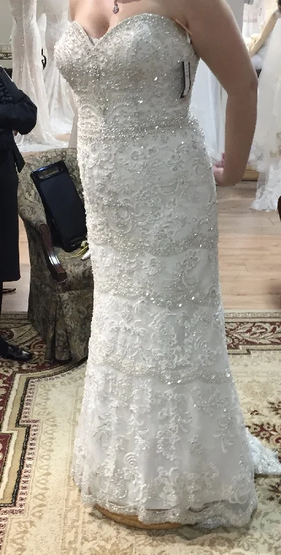 Wedding Dresses with High Neck and Embroidered Back and Sheer Sleeves for a Modest and Intricate LookAnjolique Crystal