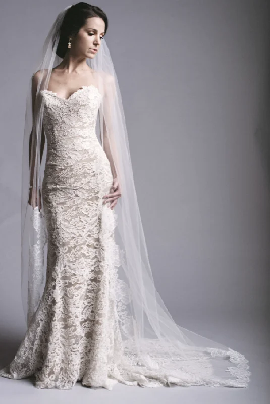 Wedding Dresses with Tiered Skirts and Bow Accents for a Girly AppealAnna Maier Lyon Wedding Dresses with Tiered Skirts and Bow Accents for a Girly AppealAnna Maier Lyon