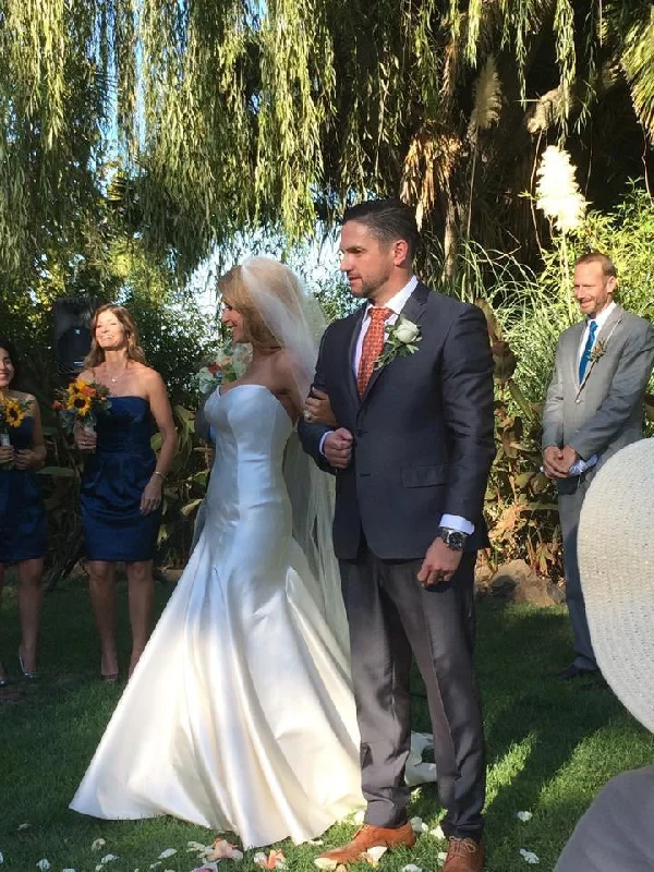Halter Neck Wedding Dresses with High Low Hem for a Modern TwistAnna Maier Ulla-Maija Helaine Halter Neck Wedding Dresses with High Low Hem for a Modern TwistAnna Maier Ulla-Maija Helaine