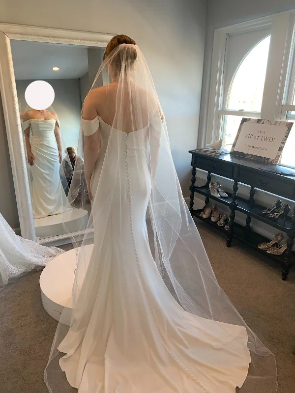 Wedding Dresses with Embroidered Stars and Sequined Dots and Sheer Sleeve and Belt for a Celestial and Playful LookAnne Barge Naomi Wedding Dresses with Embroidered Stars and Sequined Dots and Sheer Sleeve and Belt for a Celestial and Playful LookAnne Barge Naomi