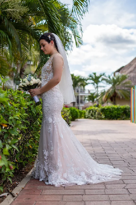 Wedding Dresses with Sheer Panels and Sequined Trim and Belt for a Sultry and Sparkly LookAnomalie Sleeveless Boatneck Mermaid Wedding Dresses with Sheer Panels and Sequined Trim and Belt for a Sultry and Sparkly LookAnomalie Sleeveless Boatneck Mermaid