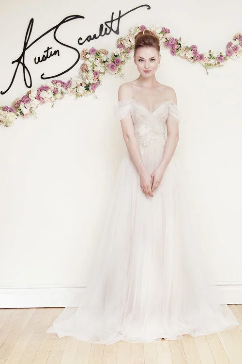Wedding Dresses with Sheer Sleeve and Sequined Cuffs and Bow at the Waist and Embroidered Skirt and Belt and Embroidered Floral Patterns for an Elegant and Intricate LookAustin Scarlett Amelia Wedding Dresses with Sheer Sleeve and Sequined Cuffs and Bow at the Waist and Embroidered Skirt and Belt and Embroidered Floral Patterns for an Elegant and Intricate LookAustin Scarlett Amelia
