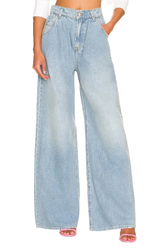 Denim jeans for a preppy - style ensemble with a polo shirt and loafersChloe High Rise Pleated Wide Leg Jeans In Sawtelle Denim jeans for a preppy - style ensemble with a polo shirt and loafersChloe High Rise Pleated Wide Leg Jeans In Sawtelle
