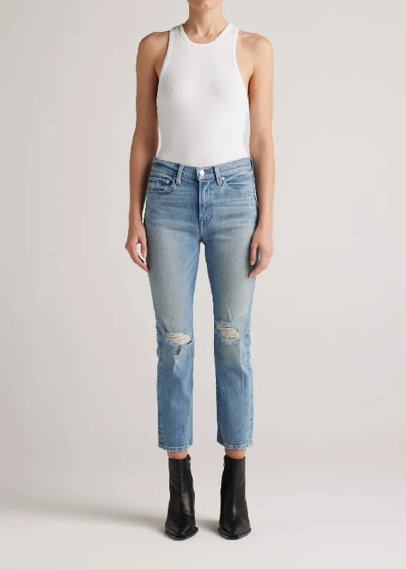 Retro - style denim jeans from a specific era such as the 50s or 60sElin Mid Rise Straight Leg Jean In Solar Ray