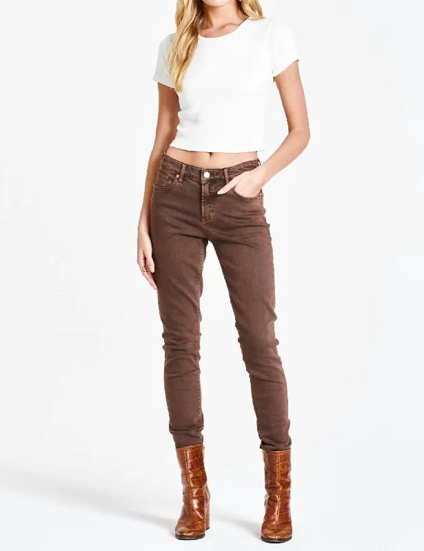 Denim jeans for a preppy - style ensemble with a polo shirt and loafersGisele Mid Rise Skinny Jean In Dark Oak
