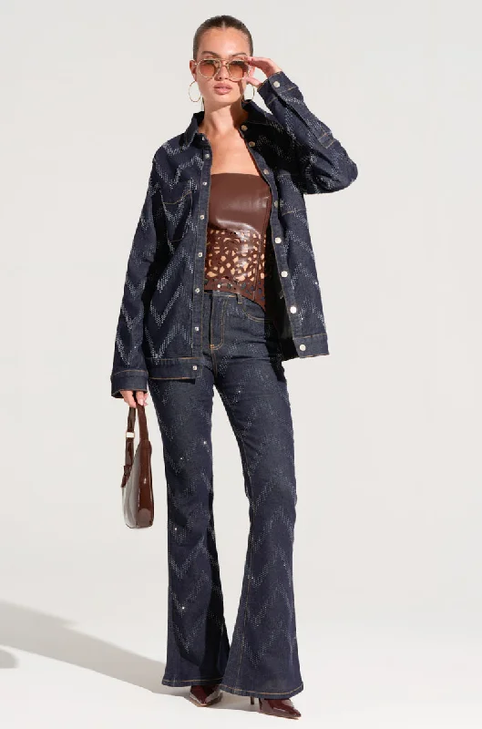 Denim jeans for a festival - inspired outfit with vibrant colors and patternsGOOD KARMA EMBELLISHED FLARE JEANS