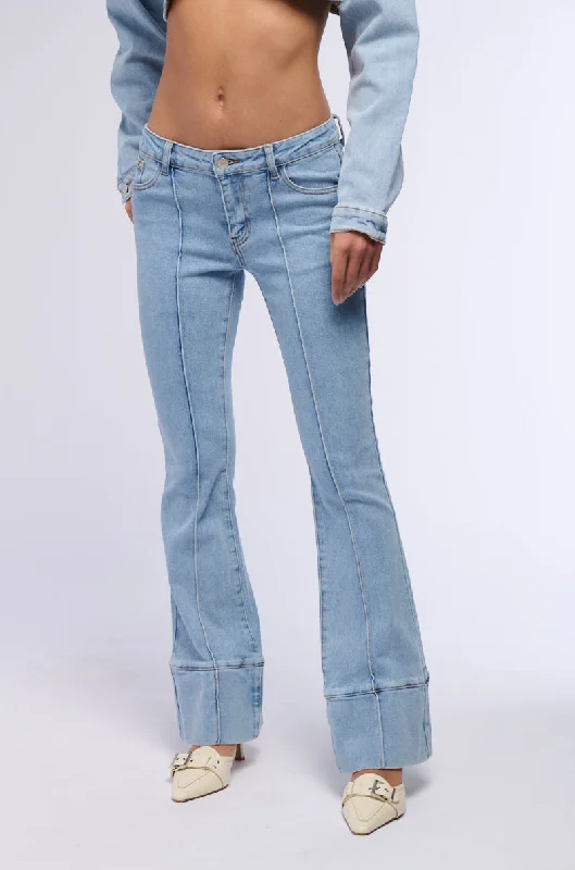 Denim jeans for a snowboarding trip with appropriate layeringHOTEL CALIFORNIA LIGHT WASH FLARE JEANS