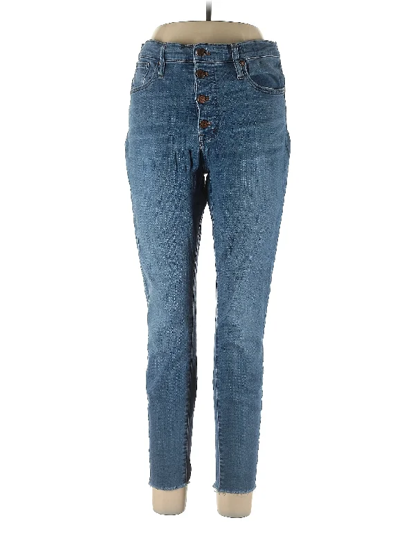 Button - fly denim jeans in a traditional Western styleMid-Rise Skinny Jeans in Medium Wash