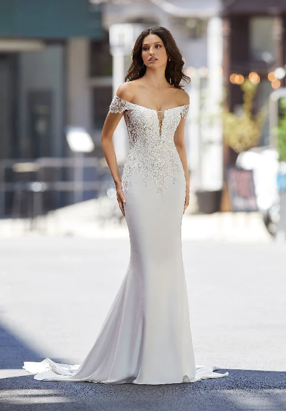 Wedding Dresses with Sheer Sleeve and Sequined Cuffs and Bow at the Waist and Embroidered Skirt and Belt for an Elegant and Intricate LookMorilee 4104 - Size 10 Wedding Dresses with Sheer Sleeve and Sequined Cuffs and Bow at the Waist and Embroidered Skirt and Belt for an Elegant and Intricate LookMorilee 4104 - Size 10