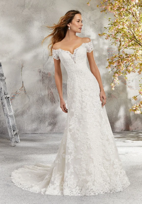 Wedding Dresses with Sequined Star Motifs and Sheer Sleeve and Ruffled Hem and Belt and Embroidered Floral Patterns for a Celestial and Flirty LookMorilee 5692 - Size 26 Wedding Dresses with Sequined Star Motifs and Sheer Sleeve and Ruffled Hem and Belt and Embroidered Floral Patterns for a Celestial and Flirty LookMorilee 5692 - Size 26