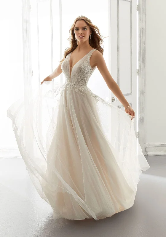 Wedding Dresses with Bell Sleeves and Ruffled Skirt for a Playful LookMorilee Amanda - Size 18 Wedding Dresses with Bell Sleeves and Ruffled Skirt for a Playful LookMorilee Amanda - Size 18