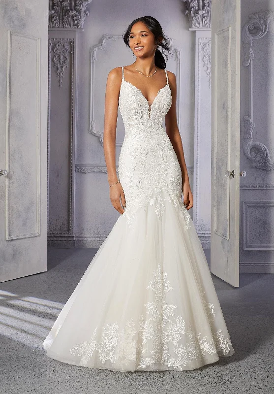 Wedding Dresses with Pleated Tulle Skirt and Sequined Geometric Shapes and Lace Overlay and Bow at the Waist for a Princess and Feminine LookMorilee Chantal - Size 12