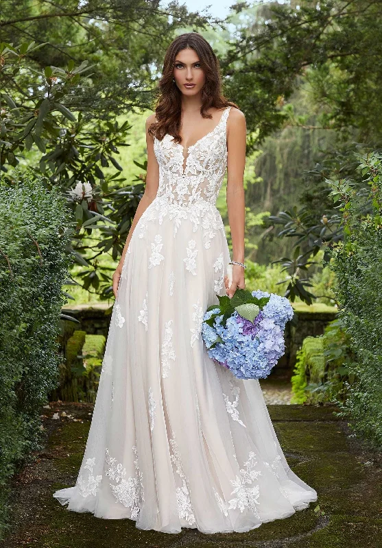 Wedding Dresses with Sequined Star Motifs and Sheer Sleeve and Ruffled Hem and Belt and Embroidered Floral Patterns for a Celestial and Flirty LookMorilee Demeter - Size 10 Wedding Dresses with Sequined Star Motifs and Sheer Sleeve and Ruffled Hem and Belt and Embroidered Floral Patterns for a Celestial and Flirty LookMorilee Demeter - Size 10