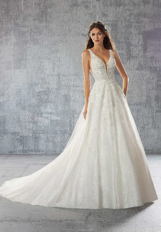 Wedding Dresses with Sequined Geometric Shapes and Lace and Chiffon Blend and Ruffled Sleeves and Belt for a Modern and Dramatic LookMorilee Serafina - Size 12 Wedding Dresses with Sequined Geometric Shapes and Lace and Chiffon Blend and Ruffled Sleeves and Belt for a Modern and Dramatic LookMorilee Serafina - Size 12