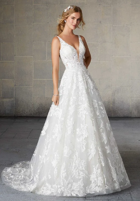 Wedding Dresses with Satin and Lace Trimmed Neckline and Ruffled Sleeves and Embroidered Skirt and Bow at the Back for a Sophisticated and Girly LookMorilee Sheila - Size 12 Wedding Dresses with Satin and Lace Trimmed Neckline and Ruffled Sleeves and Embroidered Skirt and Bow at the Back for a Sophisticated and Girly LookMorilee Sheila - Size 12
