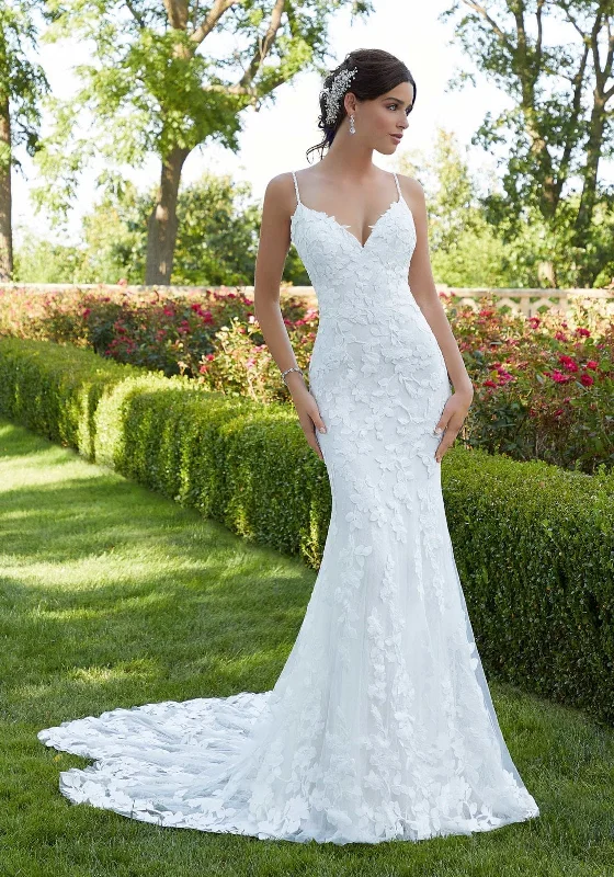 Wedding Dresses with Sheer Sleeve and Sequined Cuffs and Bow at the Waist and Embroidered Skirt and Belt for an Elegant and Intricate LookMorilee Suri 5802 - Size 12 Wedding Dresses with Sheer Sleeve and Sequined Cuffs and Bow at the Waist and Embroidered Skirt and Belt for an Elegant and Intricate LookMorilee Suri 5802 - Size 12
