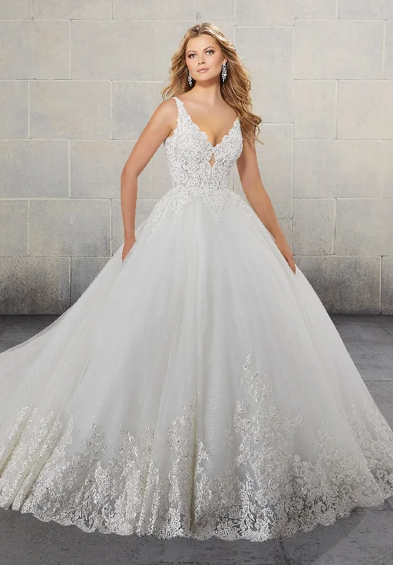 Wedding Dresses with Pleated Tulle Skirt and Sequined Geometric Shapes and Lace Overlay and Bow at the Waist and Embroidered Floral Patterns for a Princess and Feminine LookMorilee Surim - Size 14 Wedding Dresses with Pleated Tulle Skirt and Sequined Geometric Shapes and Lace Overlay and Bow at the Waist and Embroidered Floral Patterns for a Princess and Feminine LookMorilee Surim - Size 14