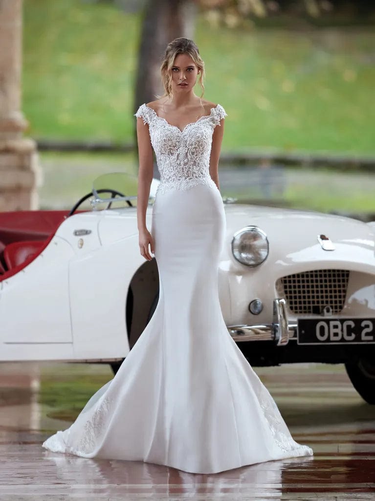 Wedding Dresses with Puff Sleeves and A Line Skirt for a Retro CharmNicole Milano NI12101 - Size 12 Wedding Dresses with Puff Sleeves and A Line Skirt for a Retro CharmNicole Milano NI12101 - Size 12