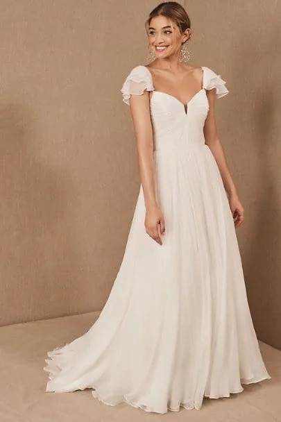 Wedding Dresses with Sheer Panels and Beaded Trim and Bow at the Back and Embroidered Paisley Patterns for a Sexy and Exotic LookNouvelle Amsale Allemande - Size 6 Wedding Dresses with Sheer Panels and Beaded Trim and Bow at the Back and Embroidered Paisley Patterns for a Sexy and Exotic LookNouvelle Amsale Allemande - Size 6