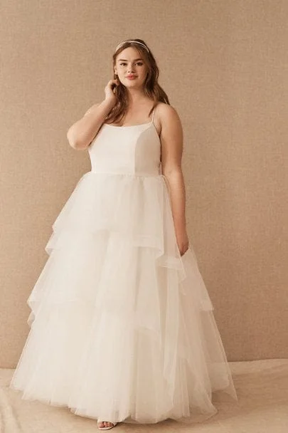 Wedding Dresses with Ruffled Hem and Bow at the Waist and Satin Ribbon and Embroidered Floral Patterns for a Sweet and Feminine LookNouvelle Amsale Cera - Size 20 Wedding Dresses with Ruffled Hem and Bow at the Waist and Satin Ribbon and Embroidered Floral Patterns for a Sweet and Feminine LookNouvelle Amsale Cera - Size 20