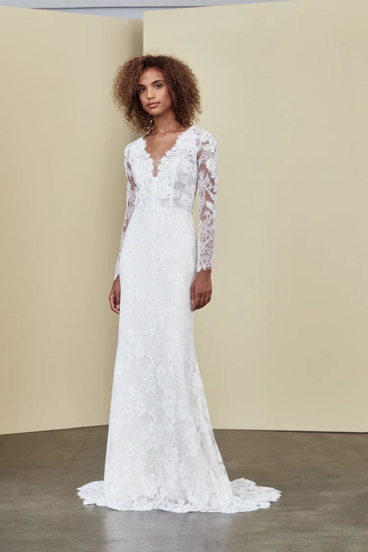 Wedding Dresses with Beaded Floral Wreath on the Bodice and High Low Hem and Belt for a Delicate and Dramatic LookNouvelle Amsale Ola - Size 14 Wedding Dresses with Beaded Floral Wreath on the Bodice and High Low Hem and Belt for a Delicate and Dramatic LookNouvelle Amsale Ola - Size 14