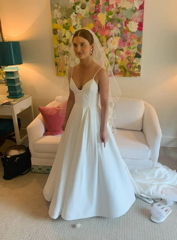 Wedding Dresses with Bell Sleeves and Ruffled Skirt for a Playful LookOther The Crawford Wedding Dresses with Bell Sleeves and Ruffled Skirt for a Playful LookOther The Crawford