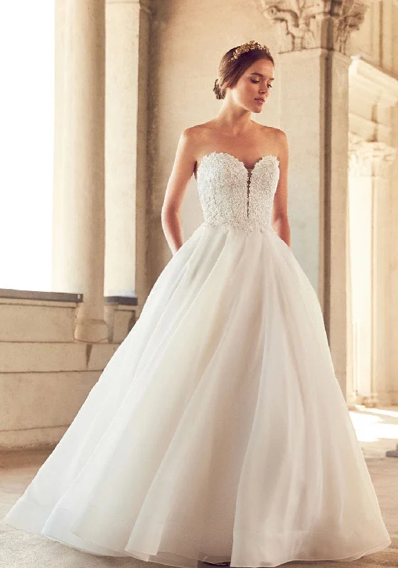 Wedding Dresses with Sheer Panels and Sequined Trim and Belt for a Sultry and Sparkly LookPaloma Blanca 4793 - Size 12 Wedding Dresses with Sheer Panels and Sequined Trim and Belt for a Sultry and Sparkly LookPaloma Blanca 4793 - Size 12