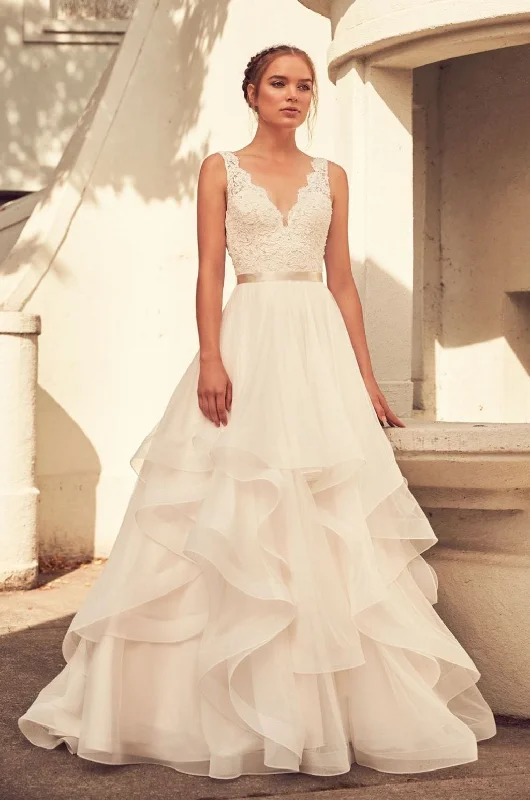 Wedding Dresses with Pleated Skirts and Lace Overlay and Bow at the Back for a Feminine and Timeless LookPaloma Blanca 4798 - Size 16 Wedding Dresses with Pleated Skirts and Lace Overlay and Bow at the Back for a Feminine and Timeless LookPaloma Blanca 4798 - Size 16