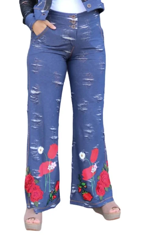 Pleated dress pants for women in a formal occasionFalling For Floral Bottoms In Dark Wash