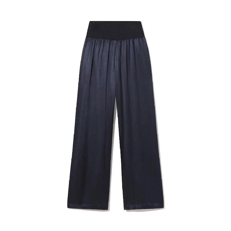 Flowy wide leg maxi pants for women in a beachy and romantic styleLola Satin Pant In Navy