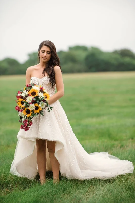 Wedding Dresses with Embroidered Floral Patterns and Tassel Hem and Sequined Bodice and Satin Sash and Belt for a Bohemian and Glamorous LookAnne Barge Jubilee Wedding Dresses with Embroidered Floral Patterns and Tassel Hem and Sequined Bodice and Satin Sash and Belt for a Bohemian and Glamorous LookAnne Barge Jubilee
