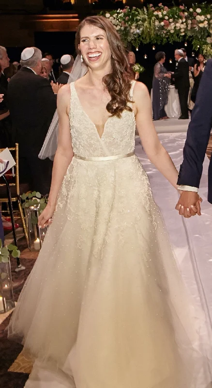 Wedding Dresses with Sequined Star Motifs and Sheer Sleeve and Ruffled Hem and Belt and Embroidered Floral Patterns for a Celestial and Flirty LookAnne Barge Versailles Wedding Dresses with Sequined Star Motifs and Sheer Sleeve and Ruffled Hem and Belt and Embroidered Floral Patterns for a Celestial and Flirty LookAnne Barge Versailles