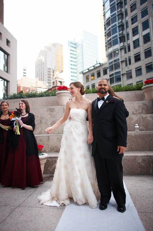 Wedding Dresses with Embroidered Stars and Sequined Dots and Sheer Sleeve and Belt for a Celestial and Playful LookDavid's Bridal Wedding Dresses with Embroidered Stars and Sequined Dots and Sheer Sleeve and Belt for a Celestial and Playful LookDavid's Bridal