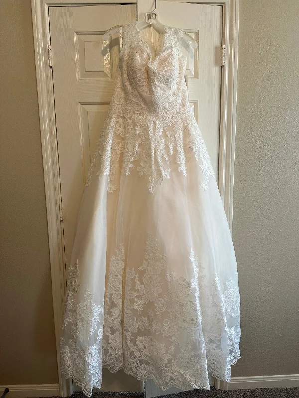 Wedding Dresses with Pleated Tulle Skirt and Sequined Geometric Shapes and Lace Overlay and Bow at the Waist and Embroidered Floral Patterns for a Princess and Feminine LookDavid's Bridal 10012594 Wedding Dresses with Pleated Tulle Skirt and Sequined Geometric Shapes and Lace Overlay and Bow at the Waist and Embroidered Floral Patterns for a Princess and Feminine LookDavid's Bridal 10012594