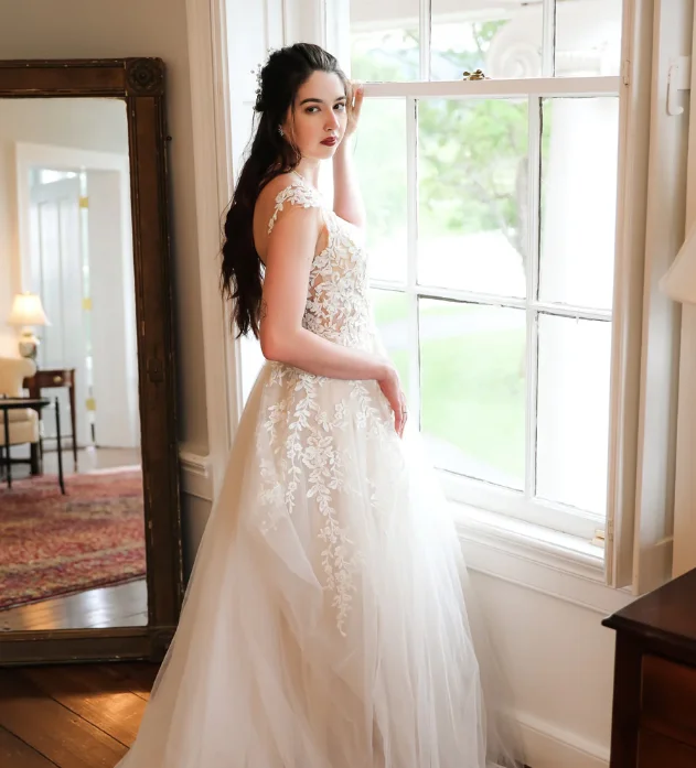 Wedding Dresses with Tassel Hem and Metallic Lace and Sequined Geometric Shapes and Satin Ribbon for a Boho and Luxurious LookDemetrios 1002 Wedding Dresses with Tassel Hem and Metallic Lace and Sequined Geometric Shapes and Satin Ribbon for a Boho and Luxurious LookDemetrios 1002
