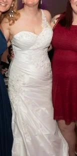Wedding Dresses with Ruffled Sleeveless Top and Embroidered Skirt and Sequined Bodice for a Dramatic and Artistic LookDemetrios Sweetheart Mermaid Wedding Dresses with Ruffled Sleeveless Top and Embroidered Skirt and Sequined Bodice for a Dramatic and Artistic LookDemetrios Sweetheart Mermaid