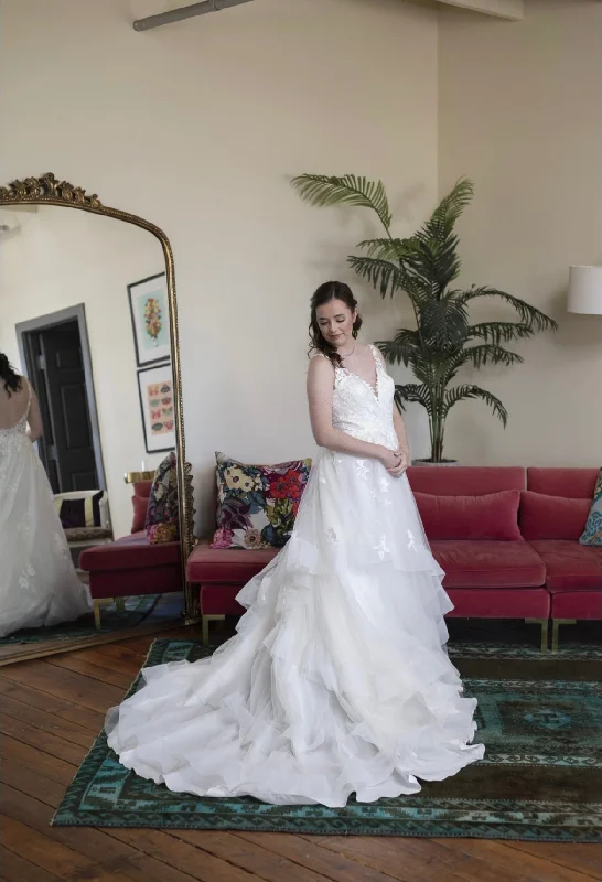 Wedding Dresses with Satin Trimmed Collar and Ruffled Hem and Bow at the Waist for a Classic and Girly LookEddy K Hollace Wedding Dresses with Satin Trimmed Collar and Ruffled Hem and Bow at the Waist for a Classic and Girly LookEddy K Hollace