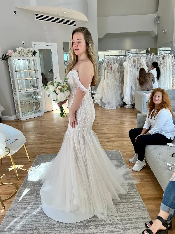 Wedding Dresses with Pleated Tulle Skirt and Sequined Geometric Shapes and Lace Overlay and Bow at the Waist for a Princess and Feminine LookEnzoani BT19-28 Wedding Dresses with Pleated Tulle Skirt and Sequined Geometric Shapes and Lace Overlay and Bow at the Waist for a Princess and Feminine LookEnzoani BT19-28