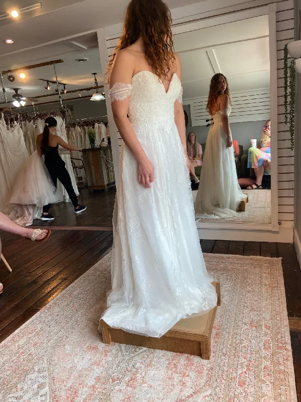 Wedding Dresses with Beaded Floral Wreath on the Bodice and Tulle Skirt and High Neck for a Delicate and Festive LookEnzoani BT19-7 Wedding Dresses with Beaded Floral Wreath on the Bodice and Tulle Skirt and High Neck for a Delicate and Festive LookEnzoani BT19-7